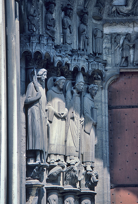 Exterior, west bay, left jamb figures
