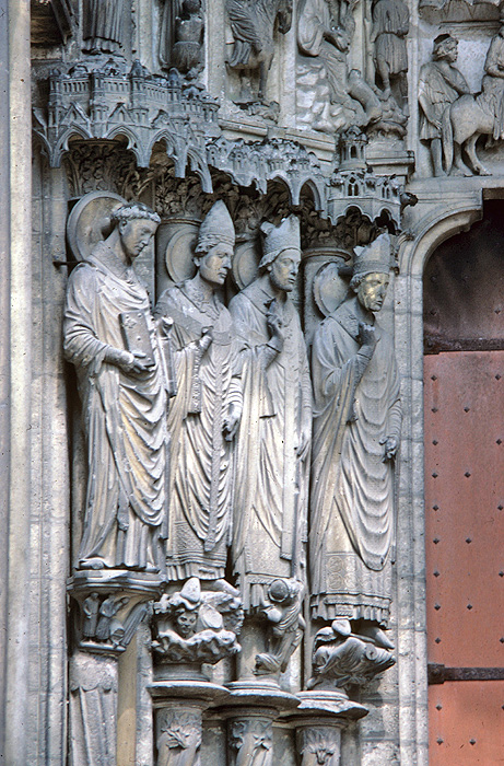 Exterior, east bay, left jamb figures