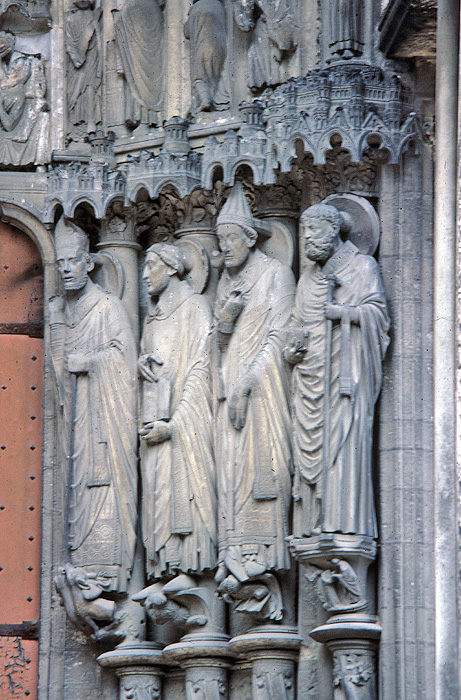 Exterior, east bay, right jamb figures