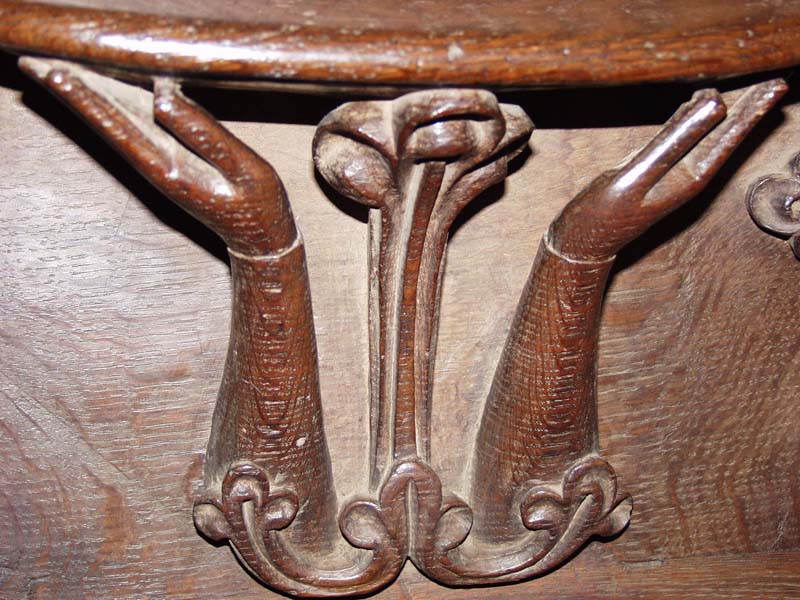 Hands, misericord, Exeter Cathedral, N-21.