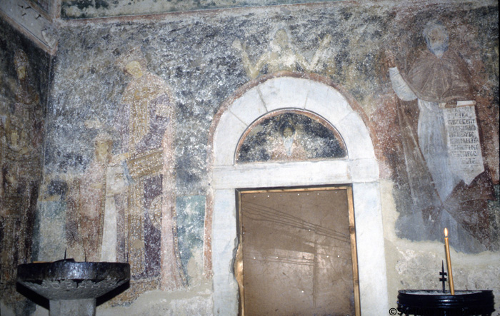 Fresco, narthex, south wall, showing Stephen V Nemanyic (Milutin) and Helena of Serbia; to right of door, monk saint