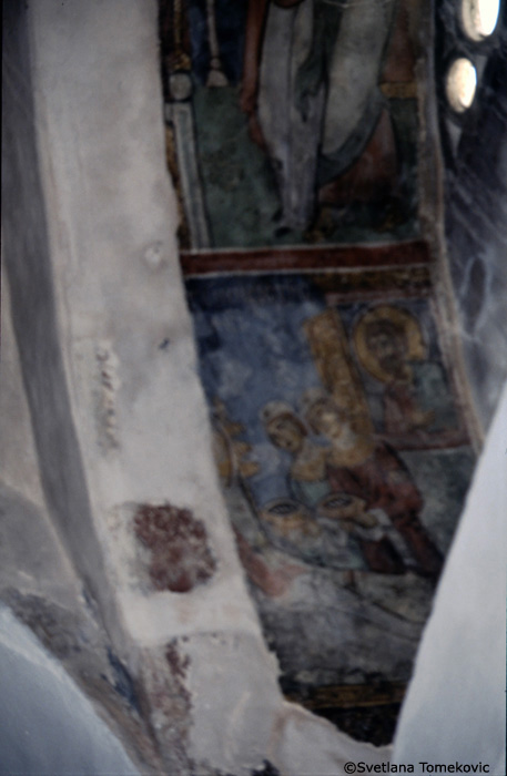 Fresco, north arcade, introdos showing the birth of the Virgin Mary