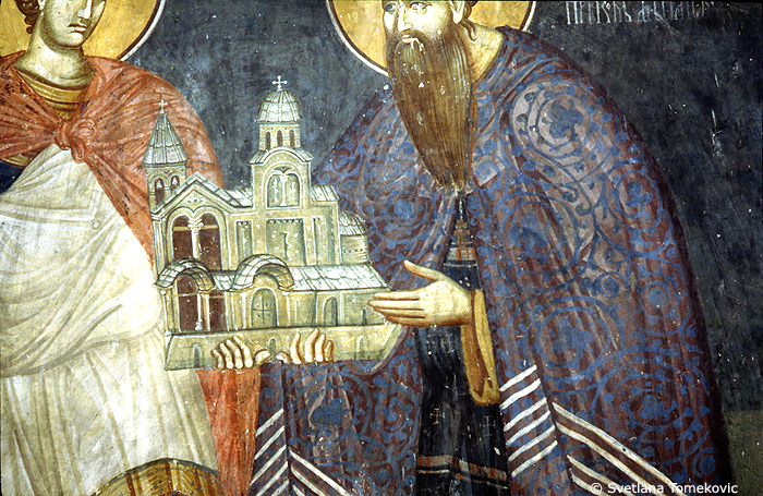 Fresco, Danilo, holding model of church, detail