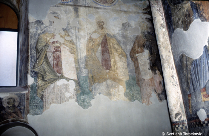 Fresco, north wall, to the right of the opening, showing  three saints