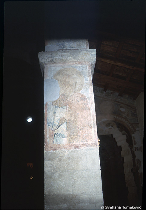 Fresco, south aisle, second arch, east face showing Saint?