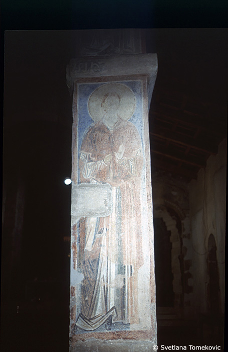 Fresco, south aisle, third arch, east face, showing Saint?