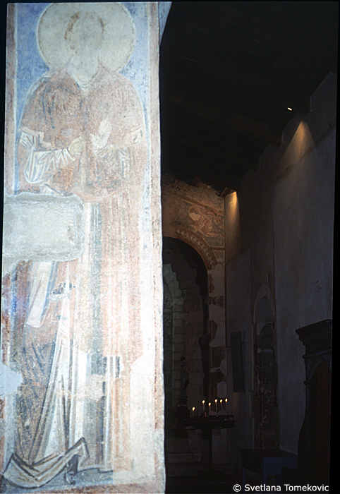Fresco, south arcade, first register, third arch, east face, showing Saint?