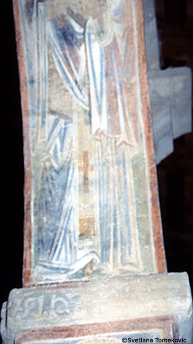 Fresco, south aisle, top of third arch, east face showing Saint?, detail