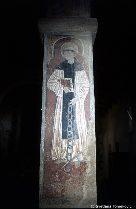 Fresco, south aisle, fourth arch, east face, showing Saint?