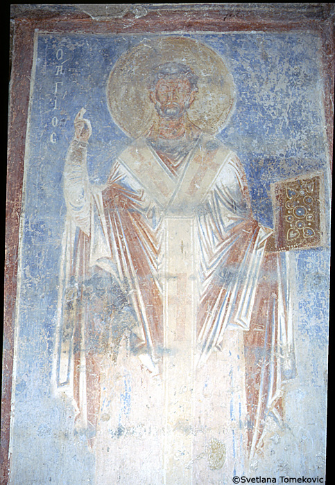 Fresco, south aisle, north wall, first register, east end, showing Saint? (detail)