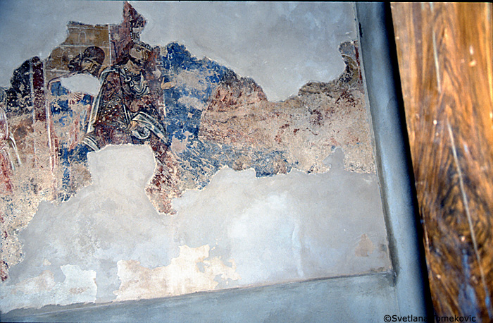 Fresco, south aisle, south wall, west end, scene below, and to the right of the first register, below Simon and Jude