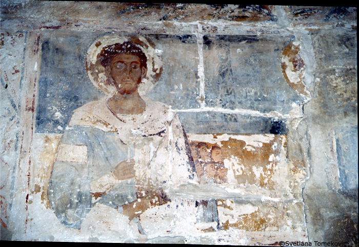 Fresco, south wall, showing sixth saint (above the niche) from the east end (detail)