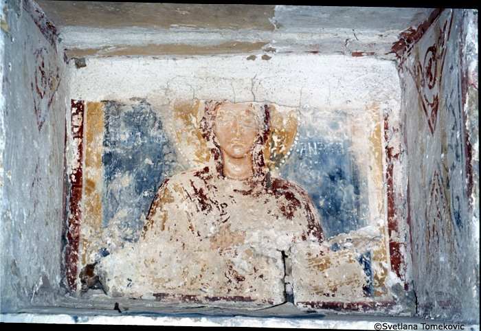 Fresco, south wall, below sixth saint from the east end, showing saint in niche