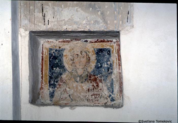 Fresco, north wall, niche on west end, showing saint?
