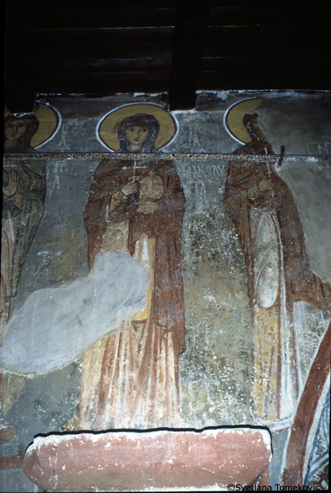 Fresco, south aisle, north wall, showing three female saints