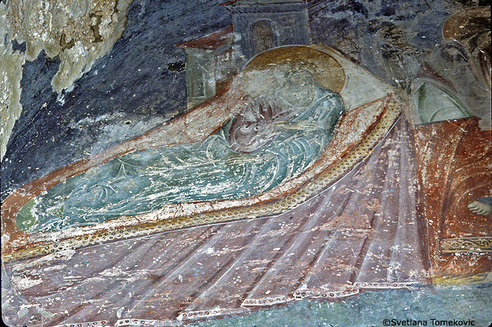 North Tympanum: Birth of Elijah (left side).