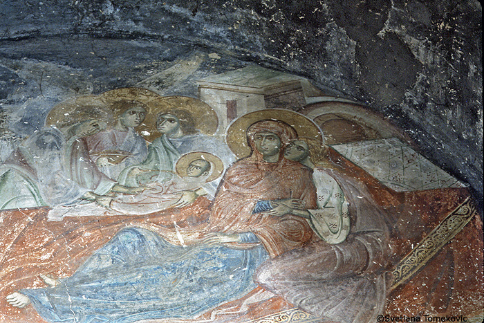 North Tympanum: Birth of Elijah (right side).
