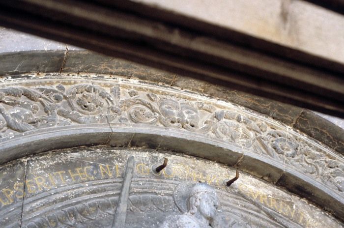 Exterior west, central portal, archivolt, foliate head, 1135-1150, Nicholaus
