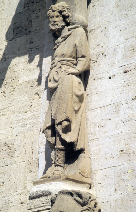 Main portal, figure to the side by School of Giovanni Pisano