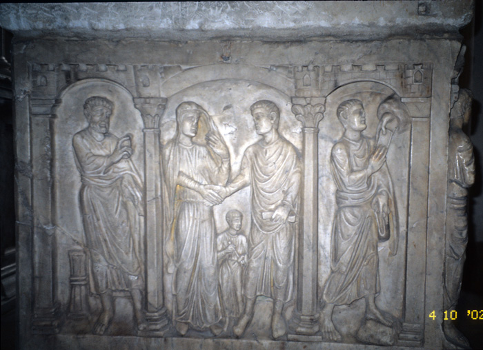 Sarcophagus, left end: male figure; family group; Moses  receiving law, late 4c.