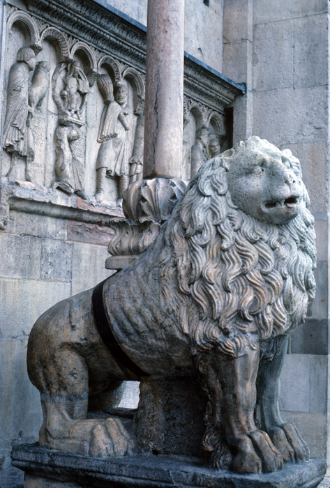 Exterior west, porch support, lion, 2c.