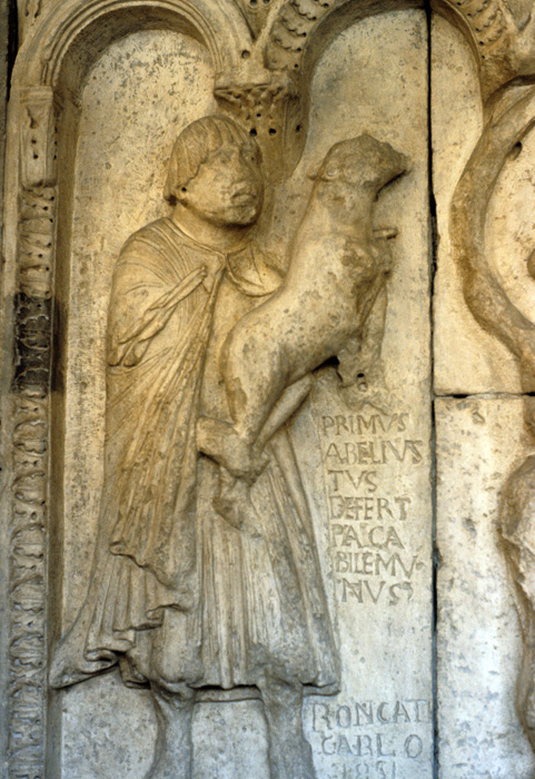 Exterior west, bay 4, frieze 3, Abel bringing offering of lamb, early 12c., Wiligelmo