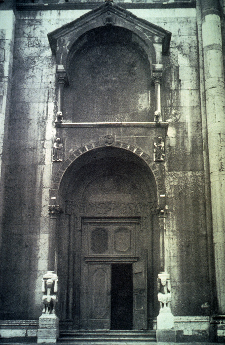 Exterior west, left porch and portal, 1122-1130, attributed to Wiligelmo