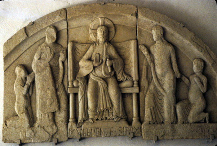 Tympanum, with Christ and figures, 12c.