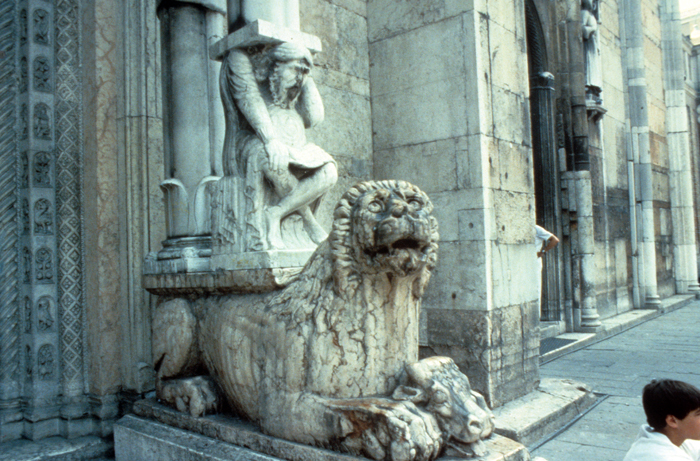 Exterior west, porch of central portal, supporting figure, lion, 1135-1150, Nicholaus
