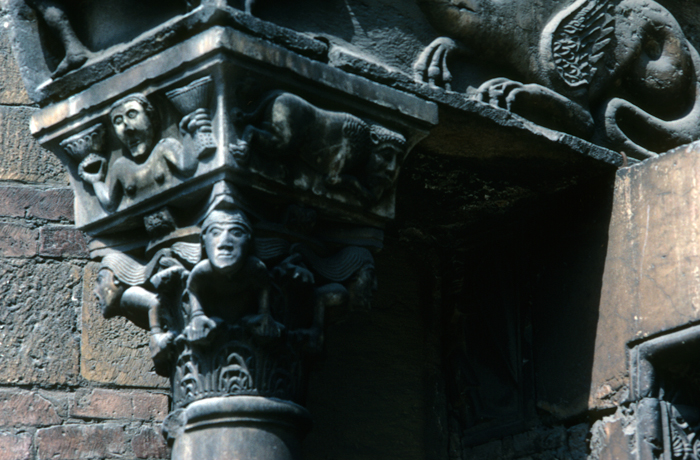 Verona Cathedral, exterior south, porch, lower capitals, female figure, 1120-1130.