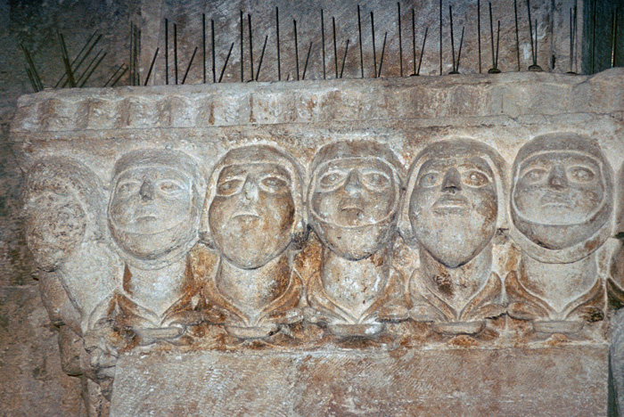 Capital with heads