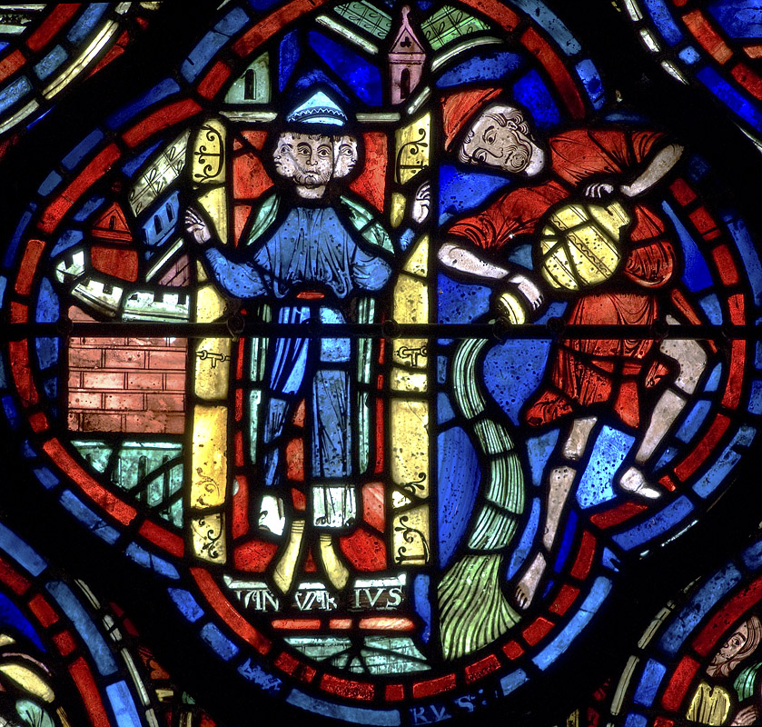 Stained glass image of three-faced Janus