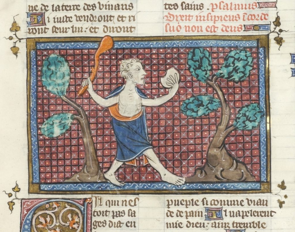 A manuscript illustration depicting a man, partly draped in a red and blue drapery, raising a club in his right hand, and holding a half-eaten round white morsel in his left hand. He is walking between two trees with two columns of French and Latin text surrounding the frame.